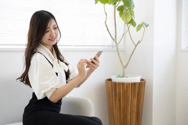 Tokyo Japan 06.19.2022. This working scene is acted by Japanese model in the office. High quality photography