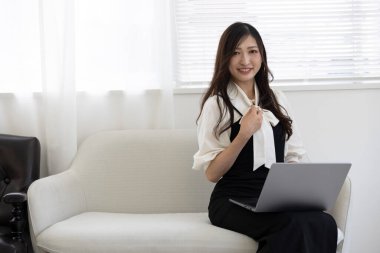 Tokyo Japan 06.19.2022. This working scene is acted by Japanese model in the office. High quality photography