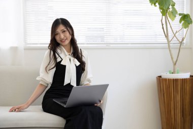 Tokyo Japan 06.19.2022. This working scene is acted by Japanese model in the office. High quality photography