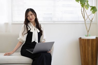 Tokyo Japan 06.19.2022. This working scene is acted by Japanese model in the office. High quality photography