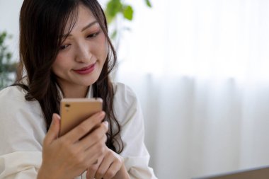 Tokyo Japan 06.19.2022. This working scene is acted by Japanese model in the office. High quality photography