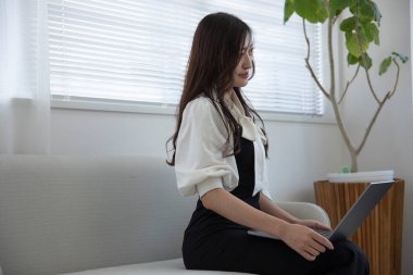 Tokyo Japan 06.19.2022. This working scene is acted by Japanese model in the office. High quality photography