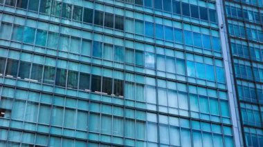 A timelapse of cloud at the building in the business town long shot. High quality 4k footage. Nakano district Nakanosakaue Tokyo Japan 07.20.2022 Here is a center of the city in Tokyo. 
