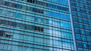 A timelapse of cloud at the building in the business town long shot. High quality 4k footage. Nakano district Nakanosakaue Tokyo Japan 07.20.2022 Here is a center of the city in Tokyo. 