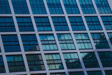 A cloud reflecting the building in the business town long shot. High quality photo. Minato district Shiodome Tokyo Japan 07.25.2022 Here is a center of the city in Tokyo. 