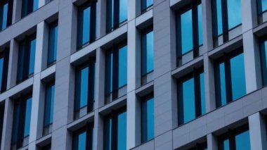 A timelapse of cloud reflecting the building in the business town long shot panning. High quality 4k footage. Chiyoda district Koujimachi Tokyo Japan 07.28.2022 Here is a center of the city in Tokyo. 