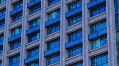 A timelapse of cloud reflecting the building in the business town long shot zoom. High quality 4k footage. Chiyoda district Koujimachi Tokyo Japan 07.28.2022 Here is a center of the city in Tokyo. 