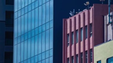 A timelapse of cloud reflecting the building in the business town long shot tilt. High quality 4k footage. Chiyoda district Koujimachi Tokyo Japan 07.28.2022 Here is a center of the city in Tokyo. 