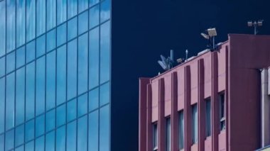 A timelapse of cloud reflecting the building in the business town long shot panning. High quality 4k footage. Chiyoda district Koujimachi Tokyo Japan 07.28.2022 Here is a center of the city in Tokyo. 