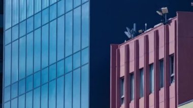 A timelapse of cloud reflecting the building in the business town long shot zoom. High quality 4k footage. Chiyoda district Koujimachi Tokyo Japan 07.28.2022 Here is a center of the city in Tokyo. 