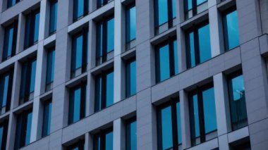 A timelapse of cloud reflecting the building in the business town long shot tilt. High quality 4k footage. Chiyoda district Koujimachi Tokyo Japan 07.28.2022 Here is a center of the city in Tokyo. 