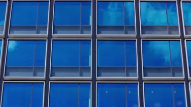 A timelapse of cloud reflecting the building in the business town long shot zoom. High quality 4k footage. Chiyoda district Koujimachi Tokyo Japan 07.28.2022 Here is a center of the city in Tokyo. 