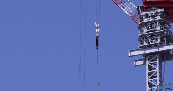 Moving Cranes Construction Daytime Long Shot High Quality Footage Minato — Stock Video