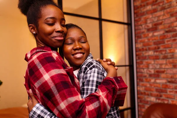 Multicultural women in pajamas together in room at evening , Lgbt relationship concept — Stock Photo, Image