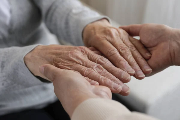 Mature Female Elderly Care Facility Gets Help Hospital Personnel Nurse — Stockfoto