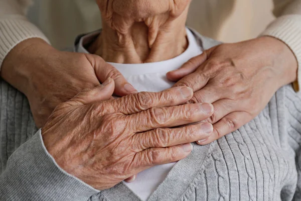 Unrecognizable Female Expressing Care Elderly Lady Hugging Her Holding Hands — Stockfoto