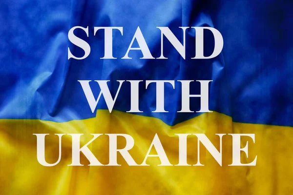 Стенд Украинским Лозунгом Написанным Поверх Взъерошенного Украинского Желтого Синего Национального — стоковое фото