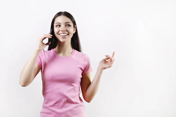 Studio Portrait Young Brunette Woman Wearing Pink Shirt Talking Phone — Fotografia de Stock