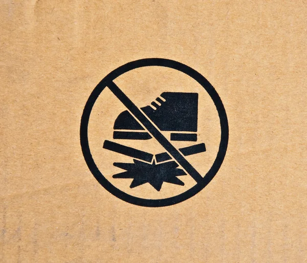 The Brown corrugated cardboard had logo about do not tread — Stock Photo, Image
