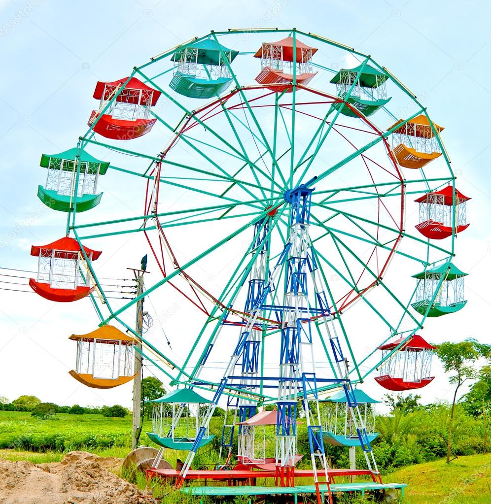 The Colorful ferris wheel and blue sky