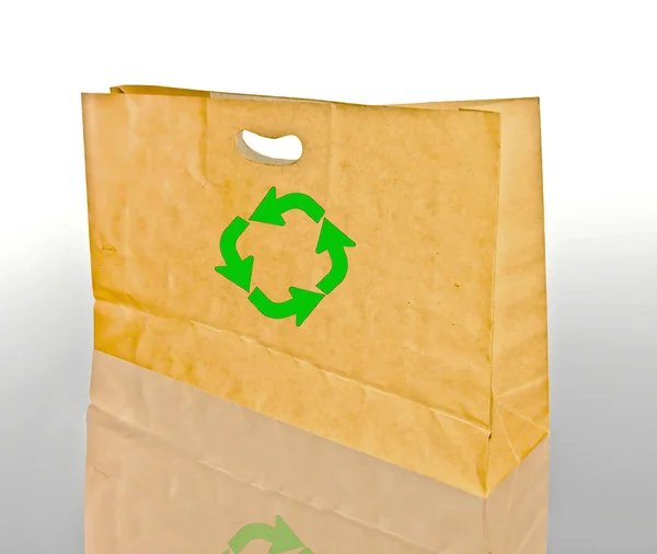 The Brown Crumpled recycle paper Bag on white reflect floor — Stock Photo, Image