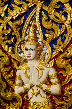 Angel duvar arka planda temple.this traditiona durumda