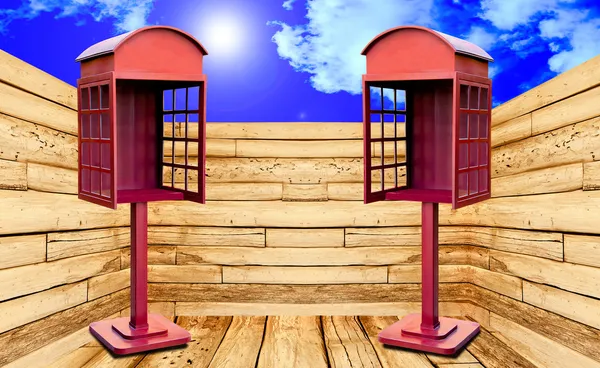 Red telephone box with perspective view on blue sky background — Stock Photo, Image