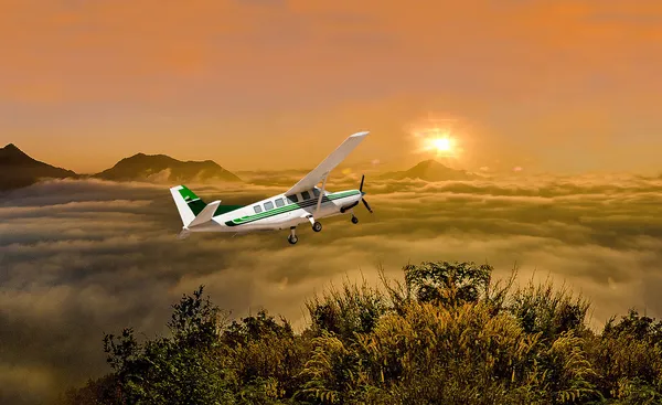 Beautiful airplane on sunrise background — Stock Photo, Image