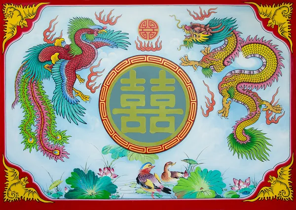 Colorful of dragon and phoenix on wall of joss house — Stock Photo, Image