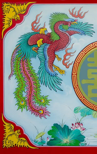 Kleurrijke van phoenix op muur van joss huis — Stockfoto