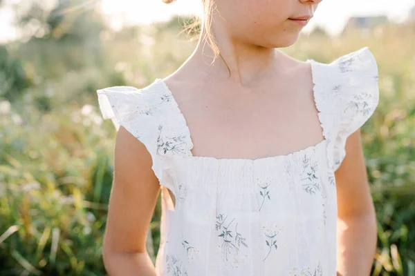 stock image Happy little girl in the field of Queen Annes Lace flower