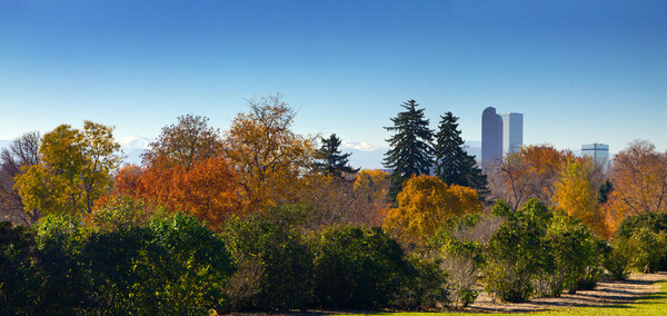 Denver, Colorado - Panoramic view of City Park and downtown skyline in Fall