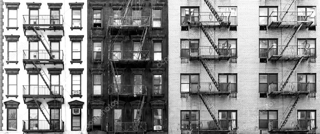 Black and white brick buildings on Second Avenue in the Upper East Side neighborhood of New York City NYC