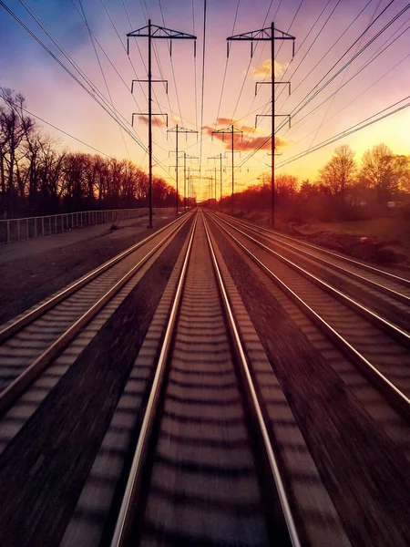 Traveling Railroad Train Tracks Setting Sunlight Distant Horizon — Stock Photo, Image