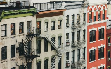 Old apartment buildings along Bowery street in Manhattan, New York City NYC