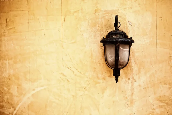 Lamp on old wall — Stock Photo, Image