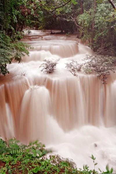 Turbid water of tropical waterfall after hard rain — Stock Photo, Image