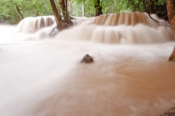 Turbid water of tropical waterfall after hard rain — Stock Photo, Image