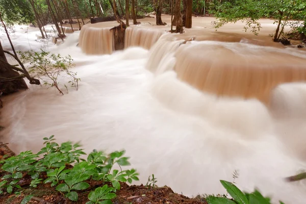 Turbid water of tropical waterfall after hard rain — Stock Photo, Image