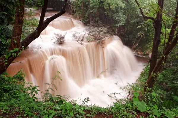 Turbid water of tropical waterfall after hard rain — Stock Photo, Image