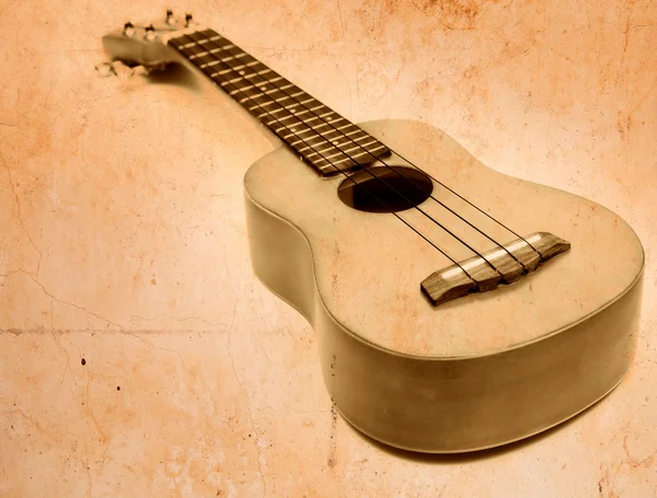 Ukulele in old style processing — Stock Photo, Image