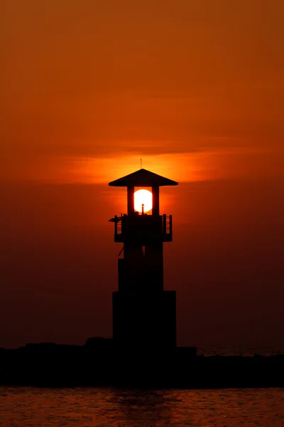 Sonnenuntergang verbergen Leuchtturm — Stockfoto