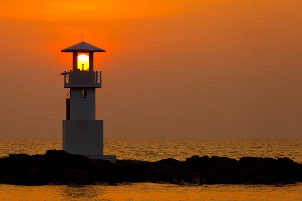 Sunset behind lighthouse — Stock Photo, Image