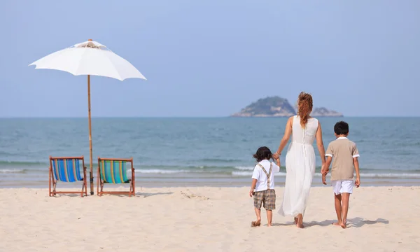 Mother and sons on beach — Stock Photo, Image