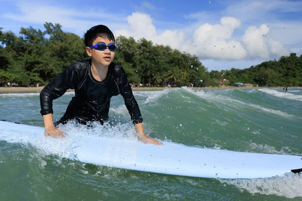 Young Boy Student Surfing Holding Softboard Trying Bring Back Sea — ストック写真