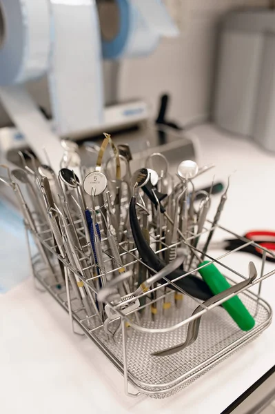 Surgical and dental instruments at medical washing machine and autoclave for sterilising. Medical hygiene for using equipments.