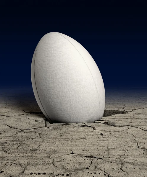 Rugby Ball Crushed into The Dirt — стоковое фото