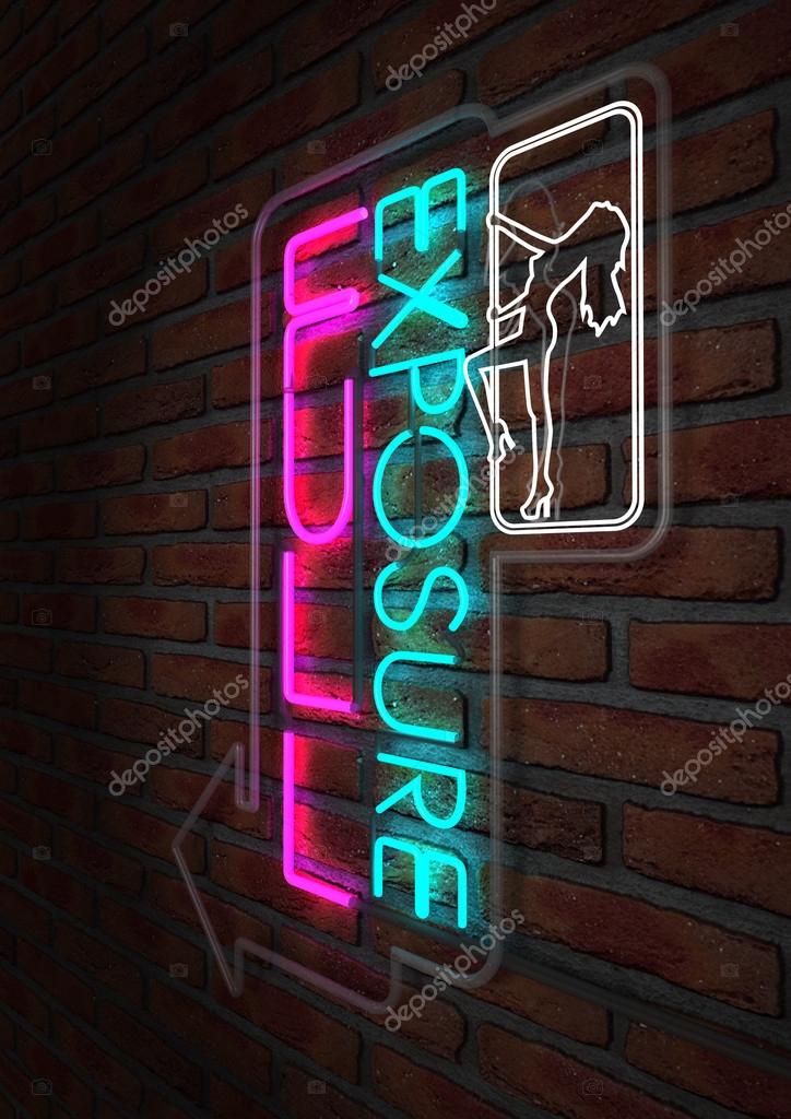 An illuminated neon sign for a strip club mounted on a brick wall incorporating an arrow, a dancing girl and the words full exposure