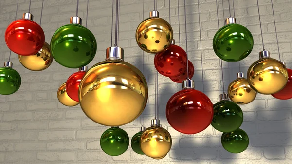 Altın bir duvara asılı yeşil Noel baubles okuyun — Stok fotoğraf