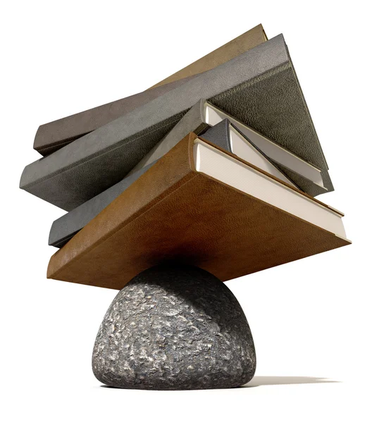 Балансирование книг на камне — стоковое фото